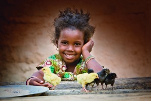 Girl with chicks. Nafi Balde, 4yrs. Yiri Koye Village. Girl with chicks. Nafi Balde, 4yrs. Yiri Koye Village.